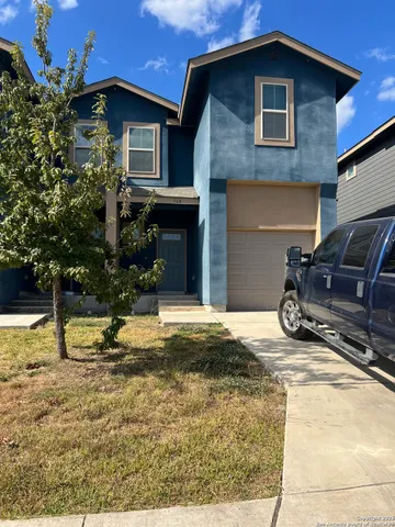 a view of a house with a patio