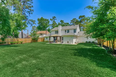 a view of a house with a big yard