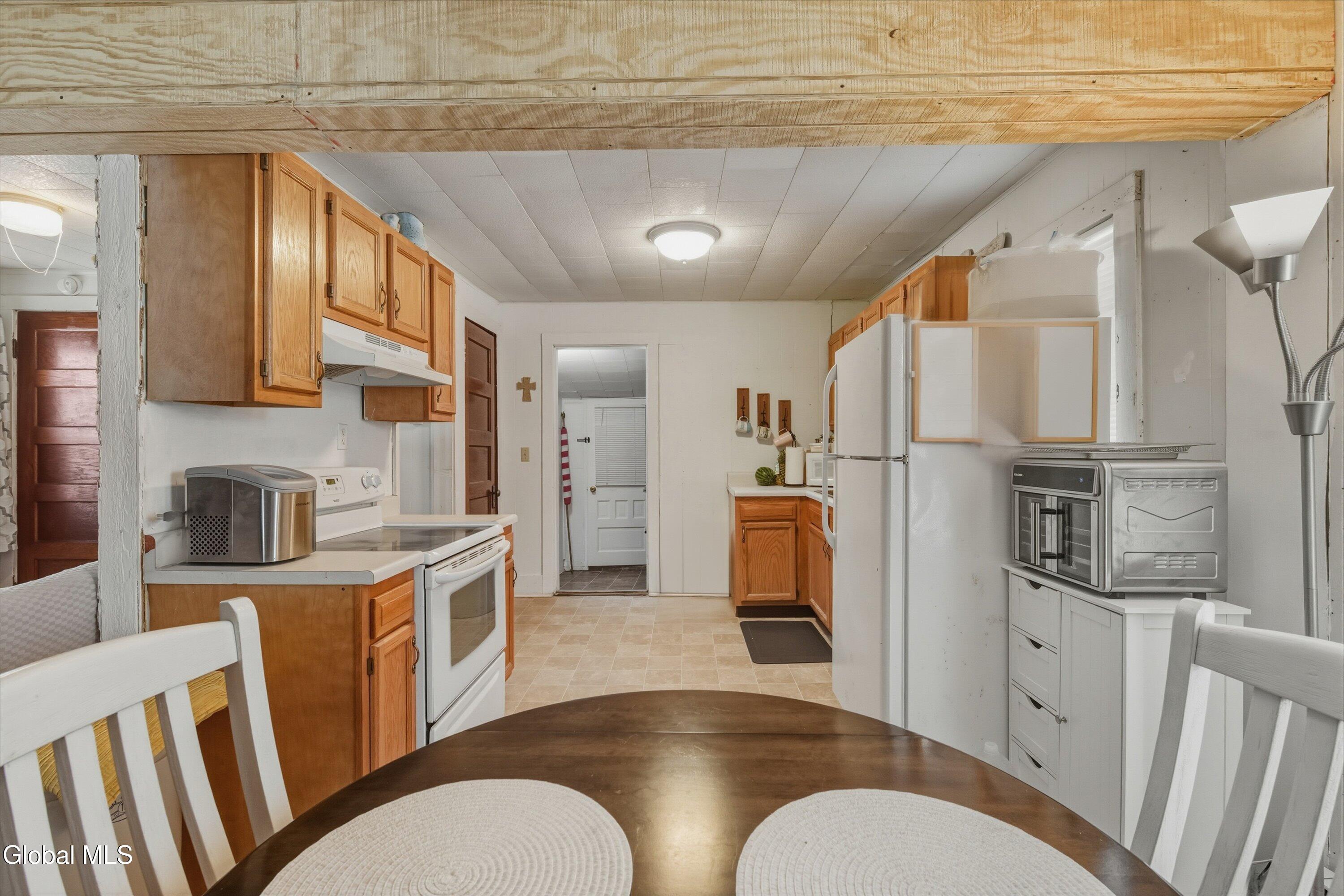 12 Tavern Road Hadley, NY 12835 - Photo 6 of 15 Dining to Kitchen