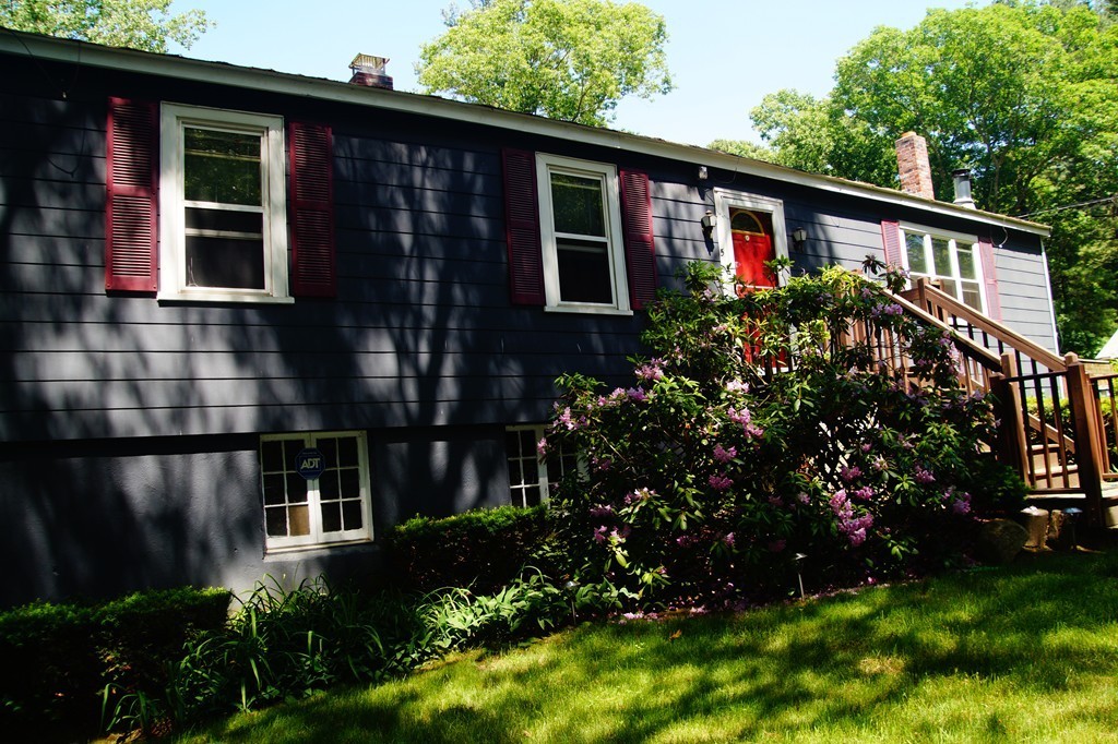 5 Harvard Road Billerica, MA 01821 - Photo 1 of 29 a front view of a house with a yard