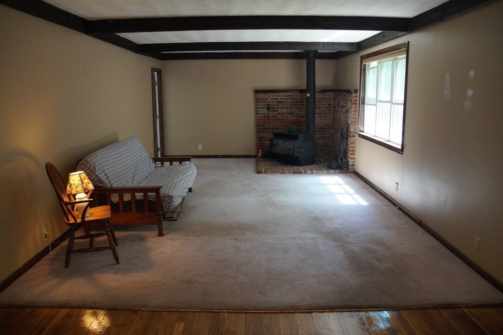 5 Harvard Road Billerica, MA 01821 - Photo 13 of 29 a view of livingroom with furniture and a window