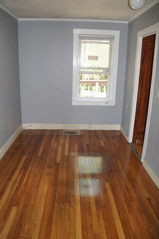 5 Harvard Road Billerica, MA 01821 - Photo 18 of 29 a view of wooden floor in a room