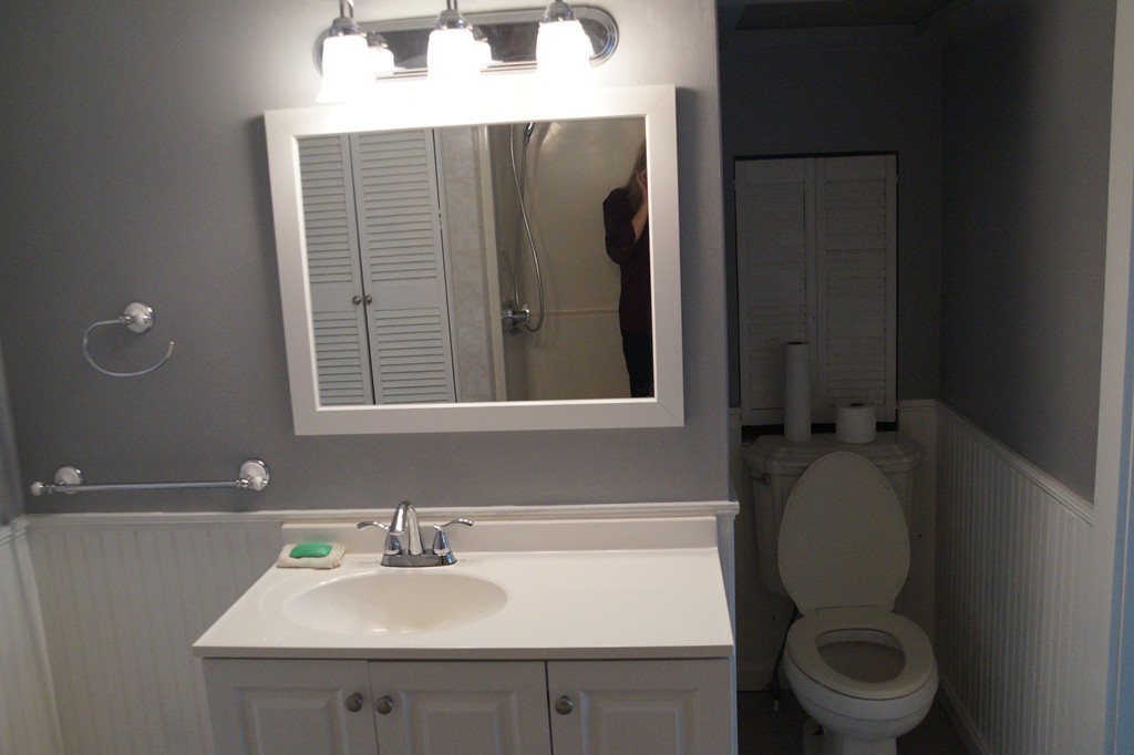 5 Harvard Road Billerica, MA 01821 - Photo 23 of 29 a bathroom with a sink toilet and mirror