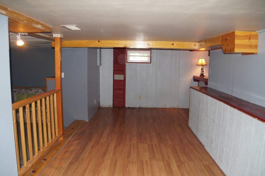 5 Harvard Road Billerica, MA 01821 - Photo 27 of 29 a view of hallway with wooden floor