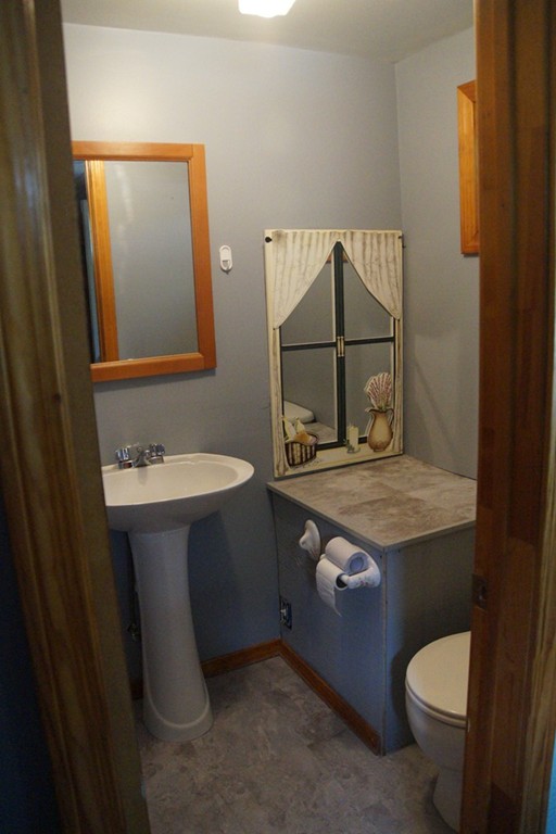 5 Harvard Road Billerica, MA 01821 - Photo 29 of 29 a bathroom with a sink toilet and mirror