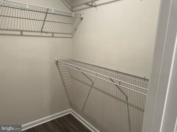 a view of a room with racks on the wall