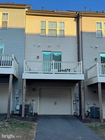 a view of a brick house with a large windows