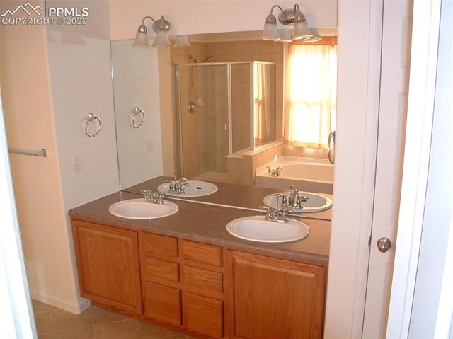 9382 St.George Road Peyton, CO 80831 - Photo 27 of 38 Dual sinks-master