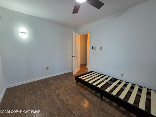 a view of wooden floor and staircase