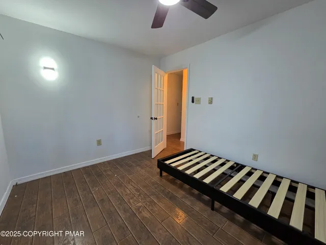 a view of wooden floor and staircase