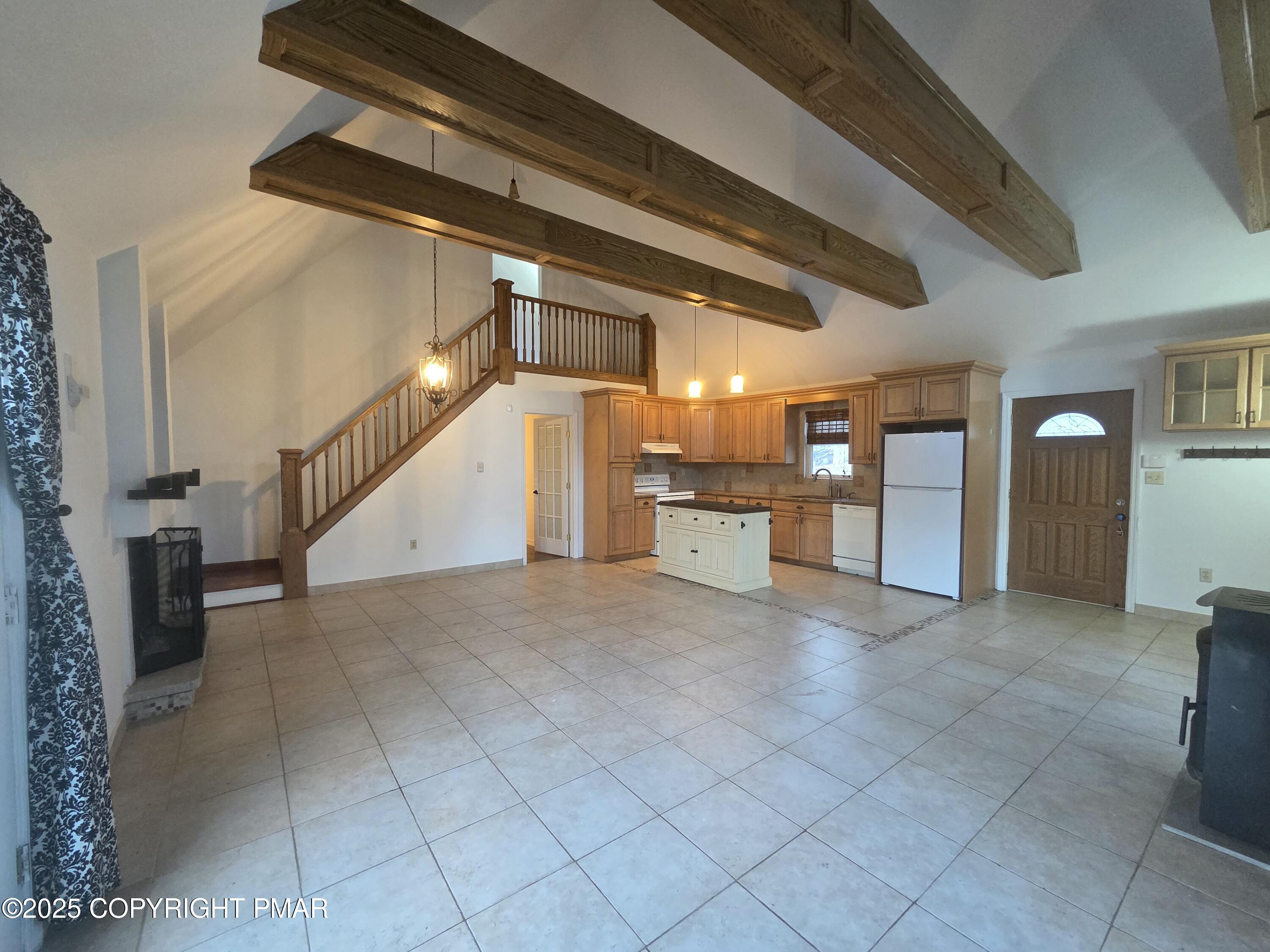 107 Berkshire Court Bushkill, PA 18324 - Photo 3 of 16 a view of a hallway with entryway and chandelier