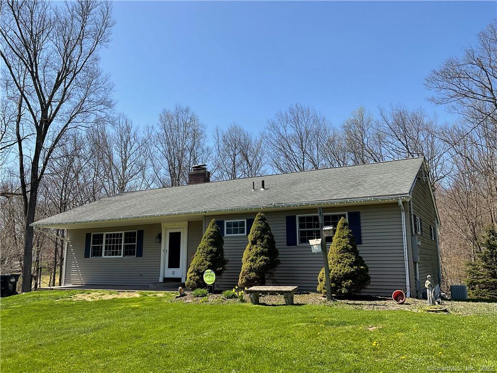 32 Ridgewood Circle Wallingford, CT 06492 - Photo 1 of 1 front view of a house with a yard