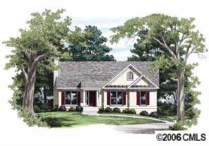 374 Sutton Spring Road York, SC 29745 - Photo 2 of 8 a view of a white house with a big yard and large trees