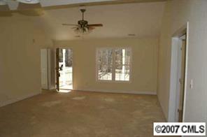 374 Sutton Spring Road York, SC 29745 - Photo 7 of 8 a view of an empty room and a window