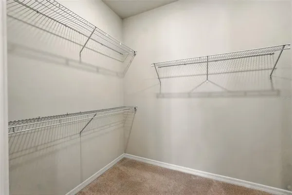 a view of a room with racks on the wall