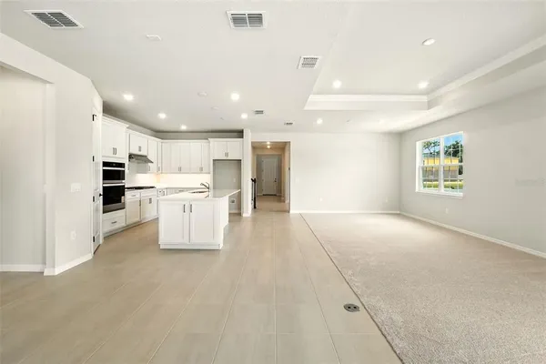 a view of kitchen with wooden floor