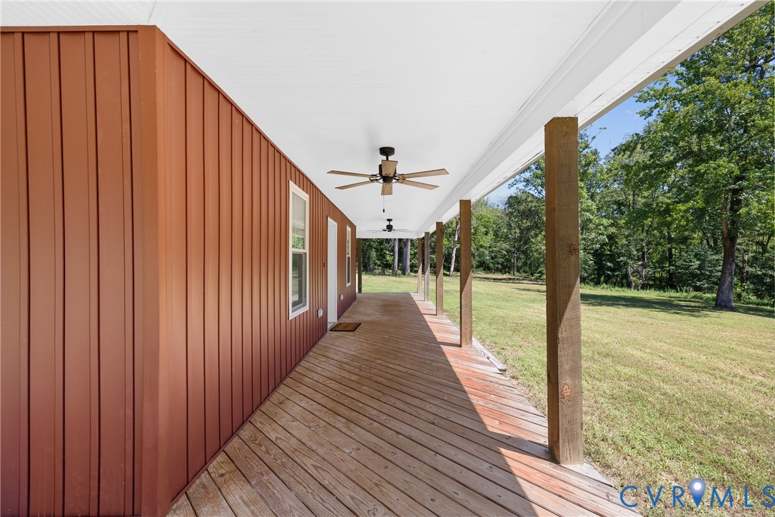 11905 Quaker Road Dinwiddie, VA 23841 - Photo 6 of 34 Expansive covered front porch with wood-plank floo