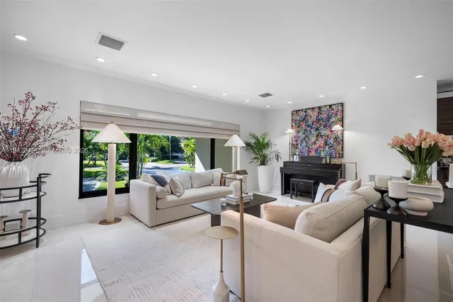a view of a dining room with furniture window and outdoor view