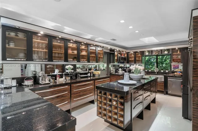 a kitchen filled with a chandelier