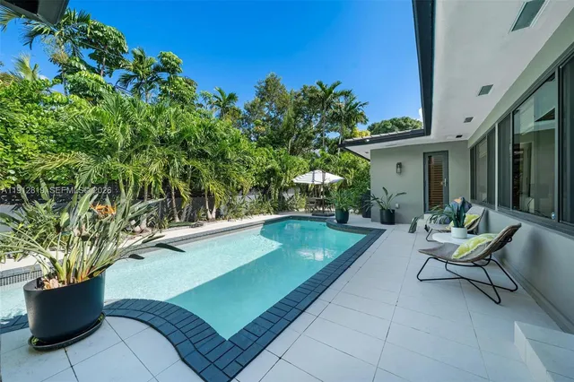 a view of a porch with furniture