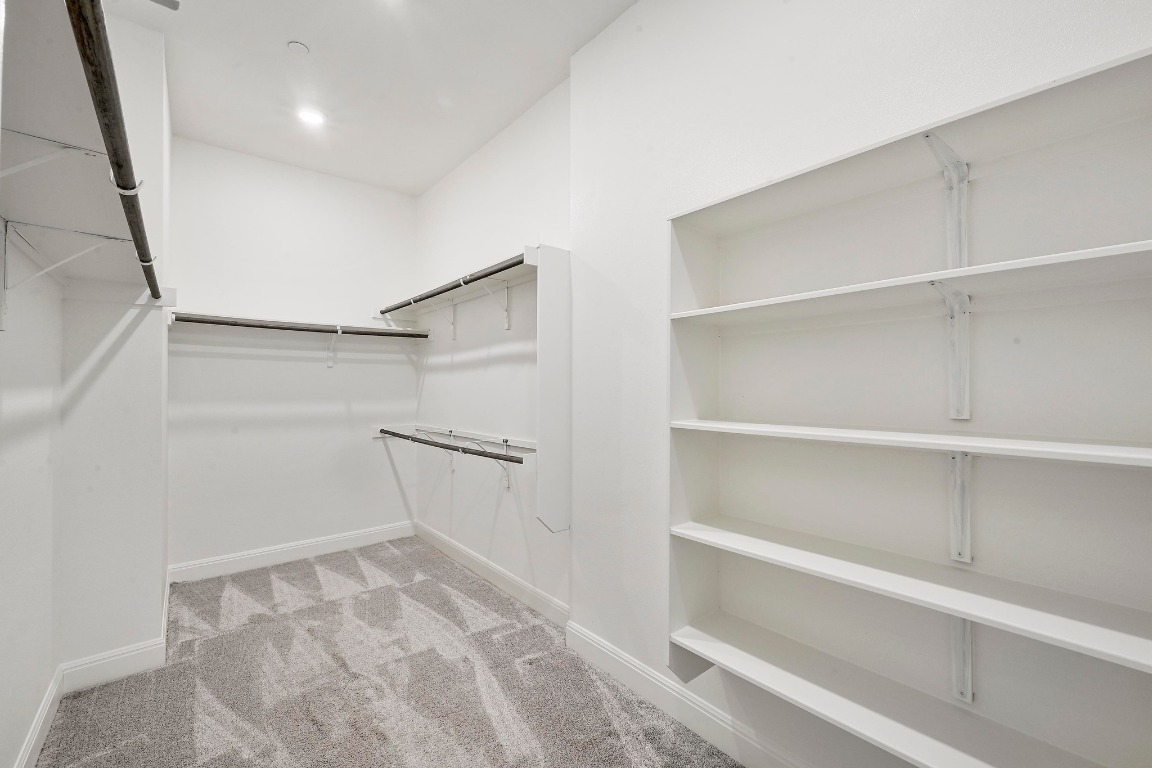 12308 Simmental Drive, Unit 94 Austin, TX 78732 - Photo 14 of 34 a view of an empty walk in closet