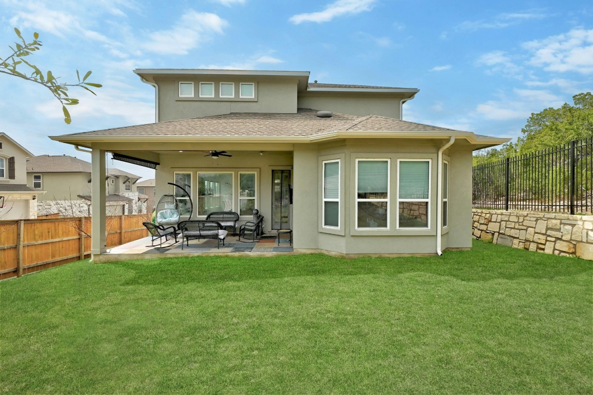 12308 Simmental Drive, Unit 94 Austin, TX 78732 - Photo 23 of 34 a view of a house with sitting area and garden