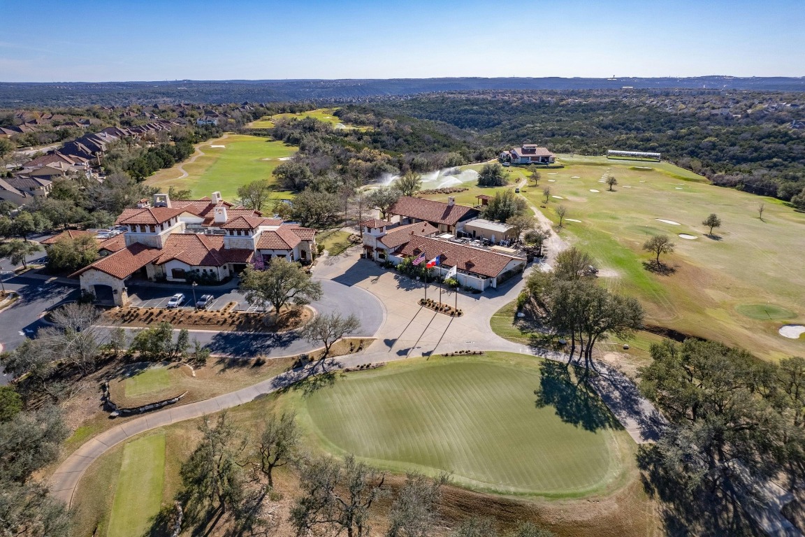12308 Simmental Drive, Unit 94 Austin, TX 78732 - Photo 27 of 34 an aerial view of residential houses with outdoor space