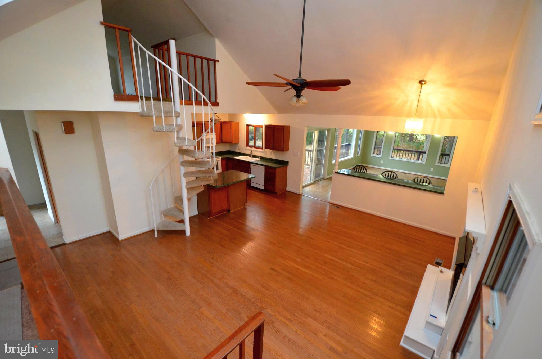 6021 Drum Point Road Deale, MD 20751 - Photo 2 of 53 Family room with beautiful hardwood floors