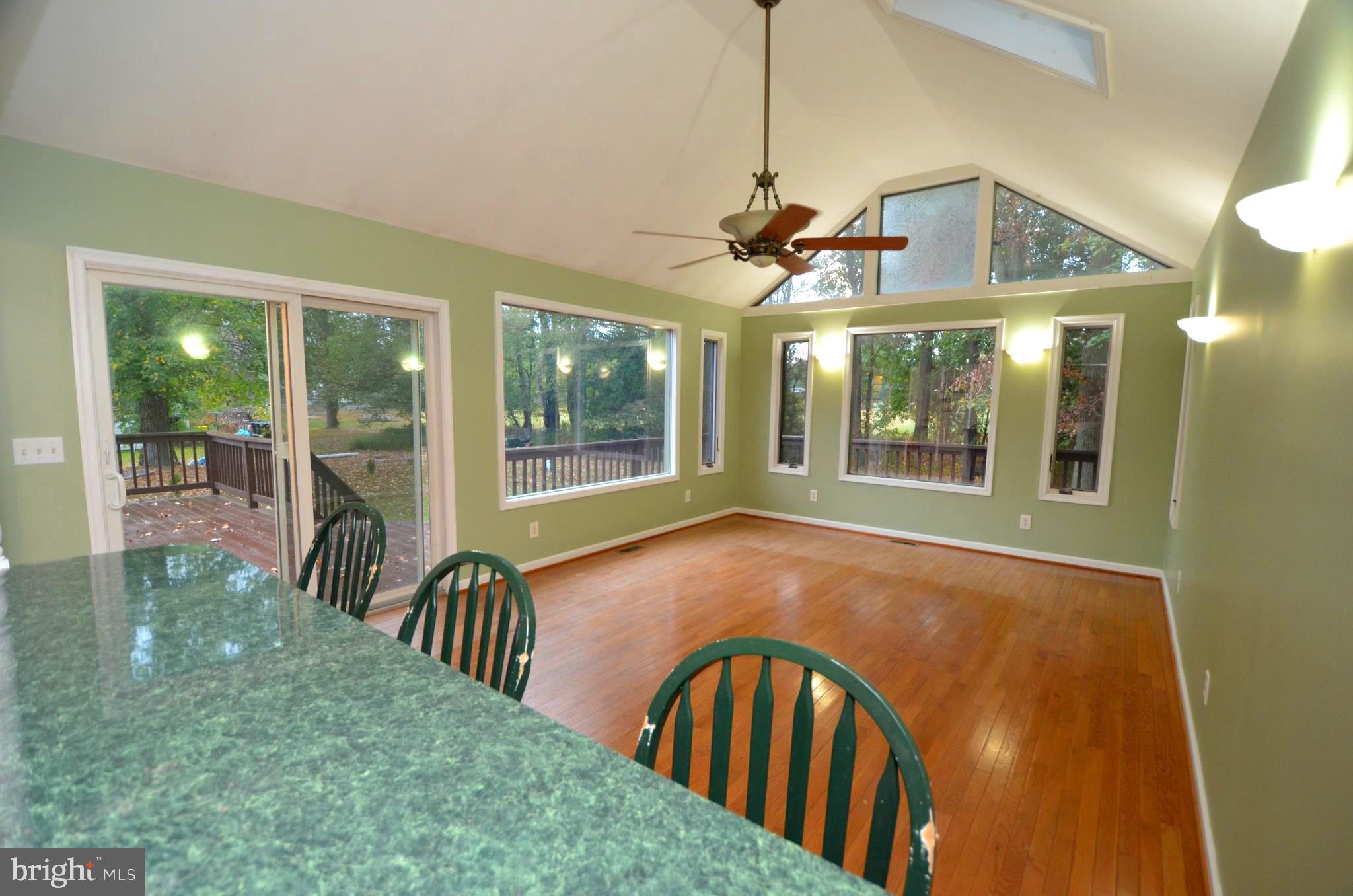 6021 Drum Point Road Deale, MD 20751 - Photo 13 of 53 Rear addition with slider to rear deck.