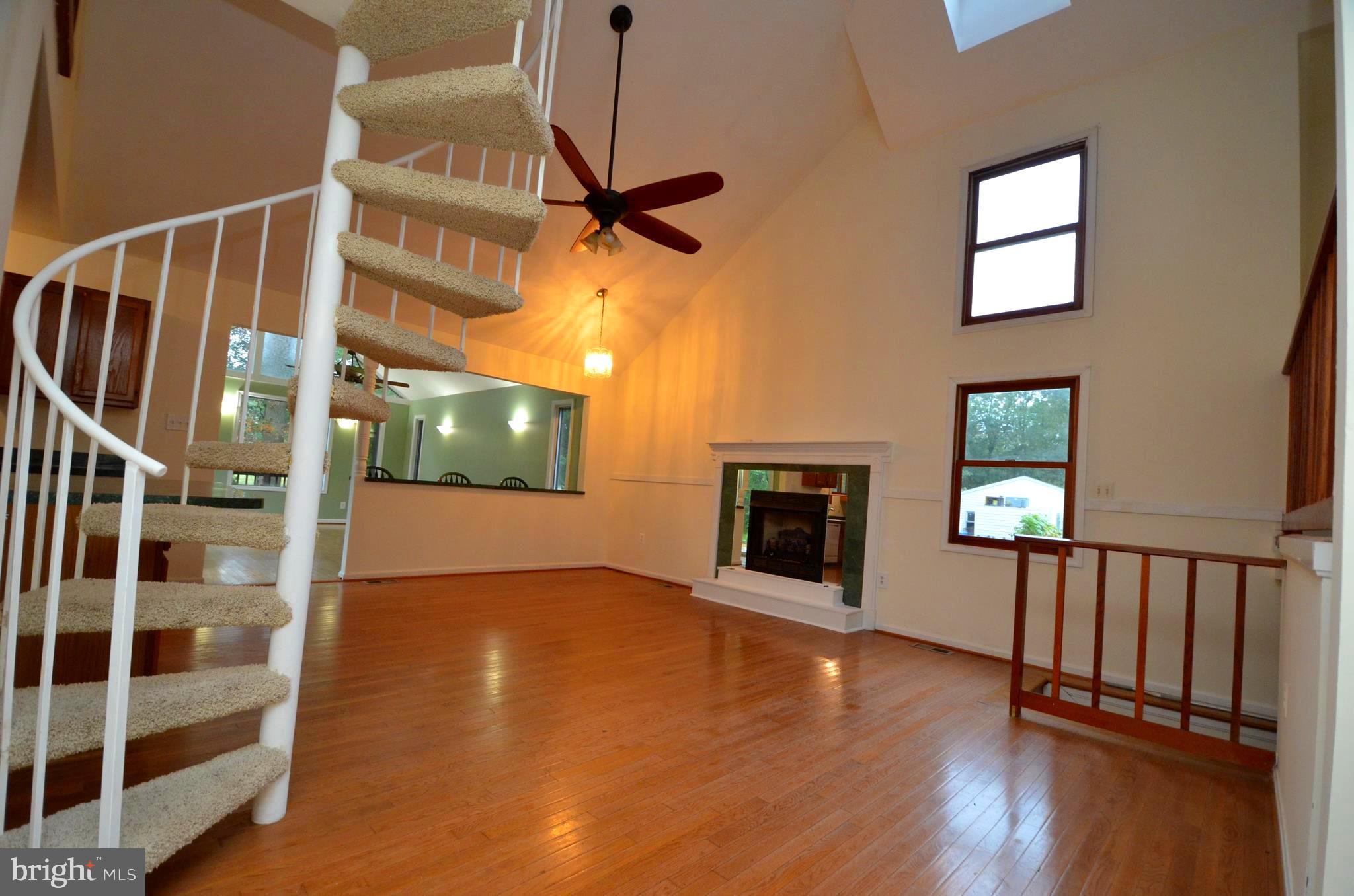 6021 Drum Point Road Deale, MD 20751 - Photo 3 of 53 Family room with gas fireplace