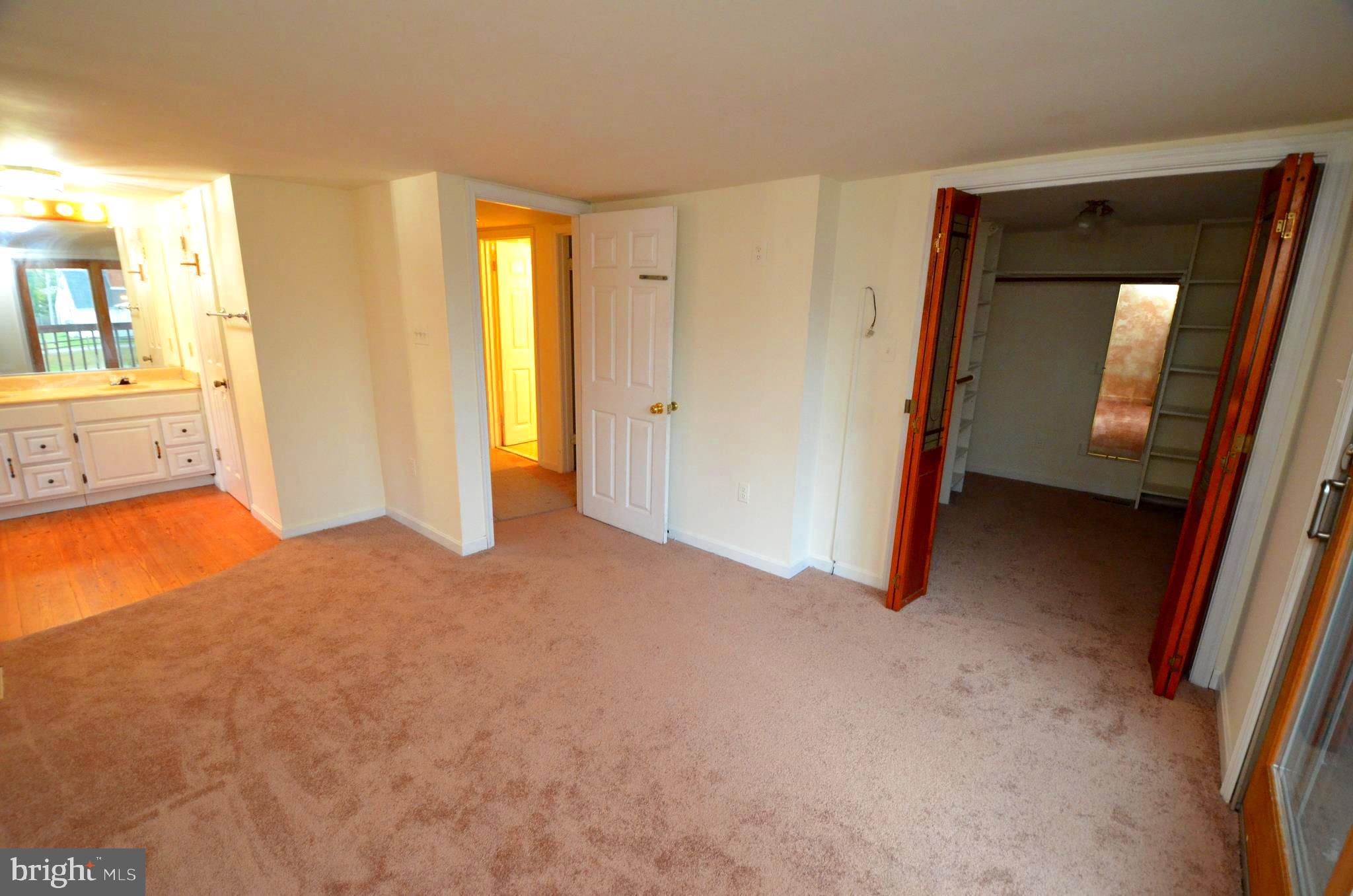 6021 Drum Point Road Deale, MD 20751 - Photo 21 of 53 Owners bedroom w/walk in closet