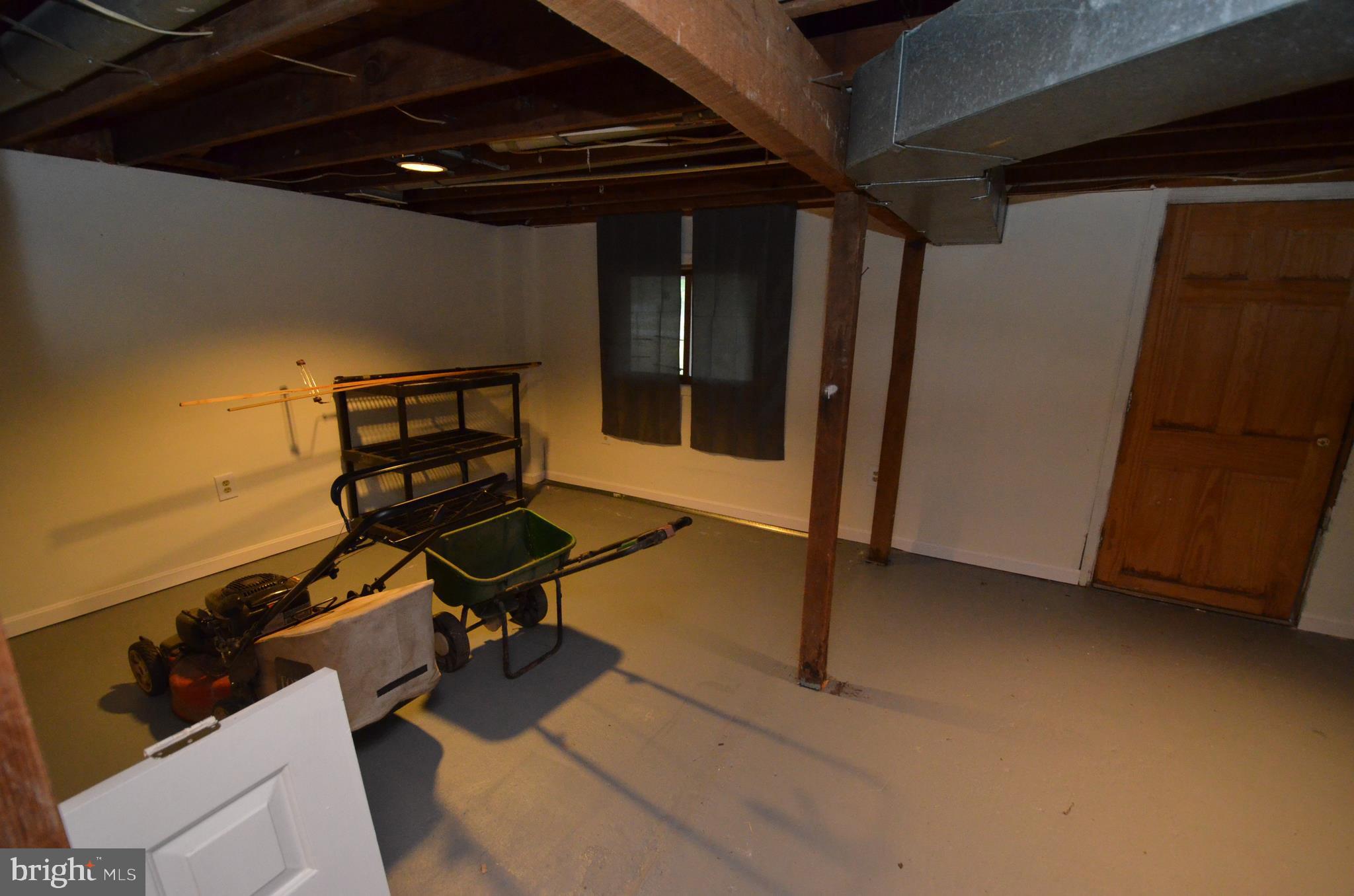 6021 Drum Point Road Deale, MD 20751 - Photo 37 of 53 Lower level area for storage
