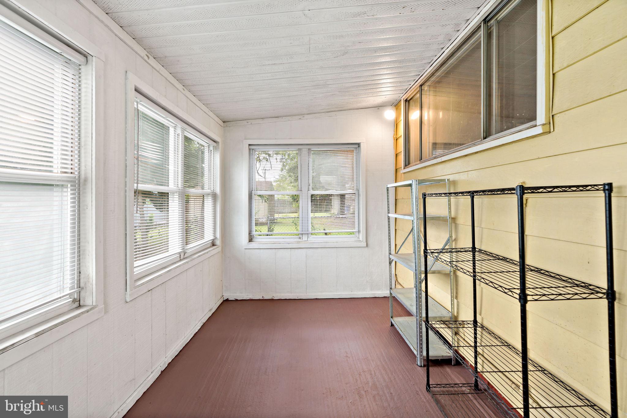 3421 Cornwall Road Dundalk, MD 21222 - Photo 28 of 45 an empty room with windows