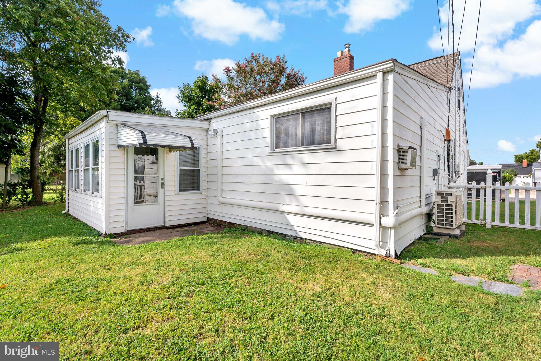 3421 Cornwall Road Dundalk, MD 21222 - Photo 4 of 45 a view of a house with a yard