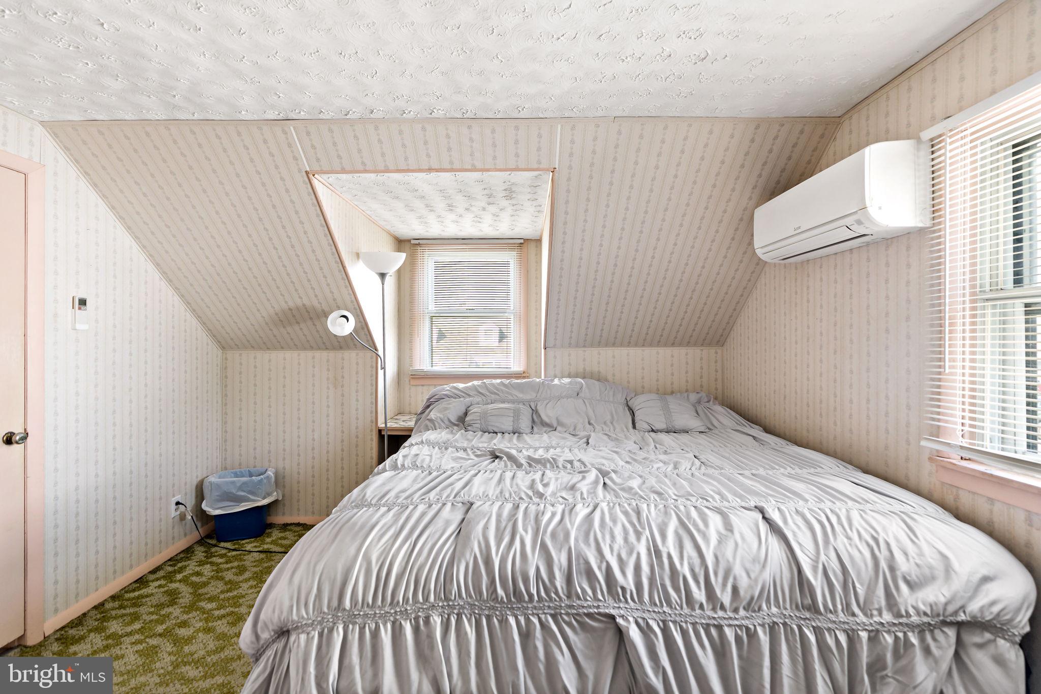 3421 Cornwall Road Dundalk, MD 21222 - Photo 41 of 45 a bedroom with a bed and a window