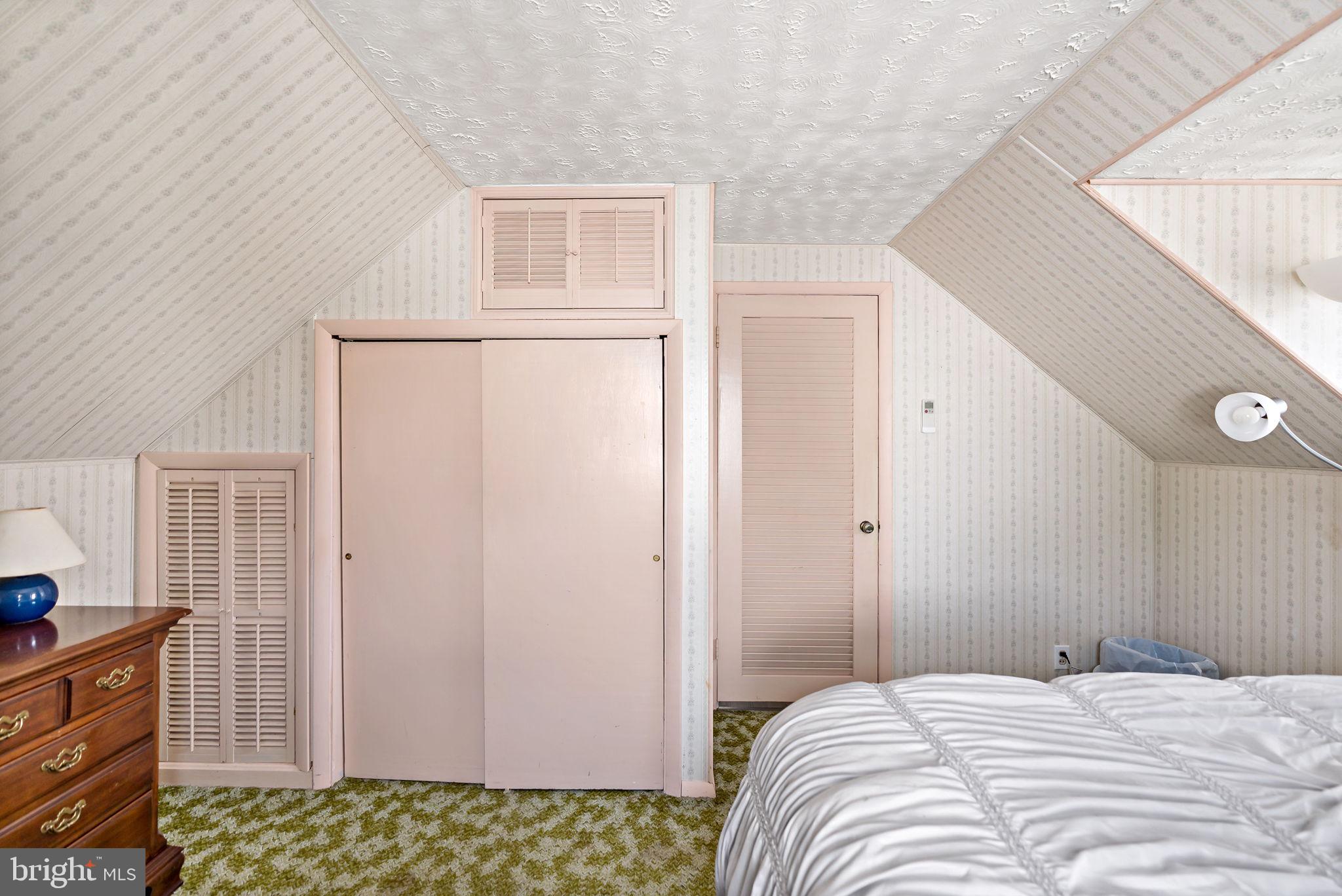 3421 Cornwall Road Dundalk, MD 21222 - Photo 42 of 45 a bedroom with a bed and a dresser