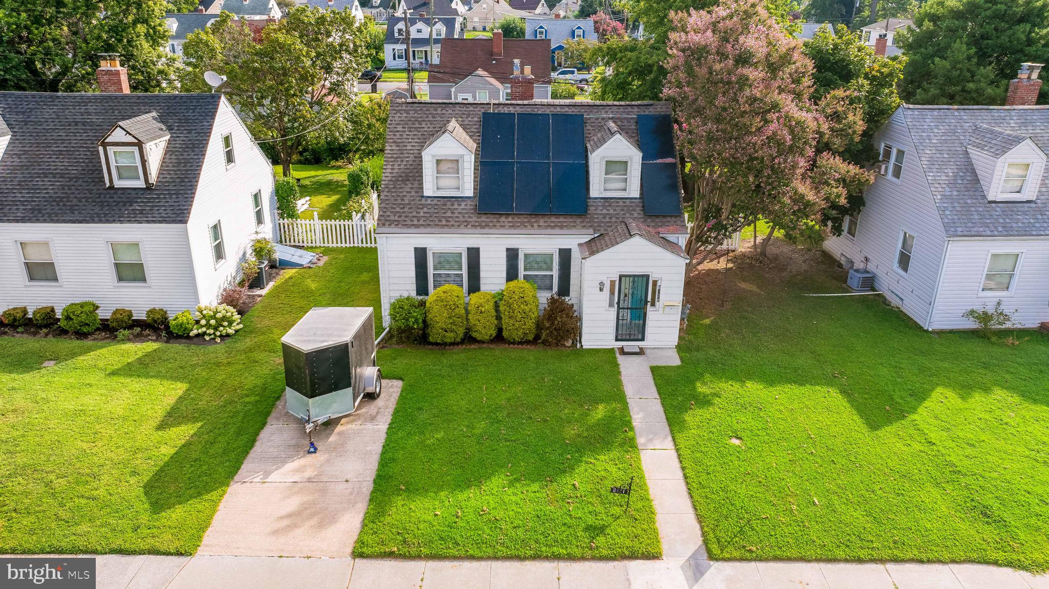 3421 Cornwall Road Dundalk, MD 21222 - Photo 9 of 45 a view of a house with a yard porch and sitting area