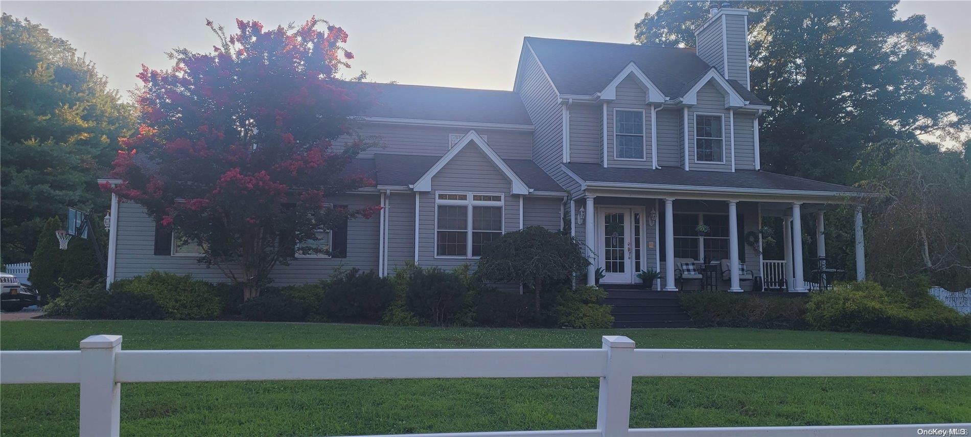 62 Hallock Landing Road Rocky Point, NY 11778 - Photo 1 of 1 a front view of a house with a yard