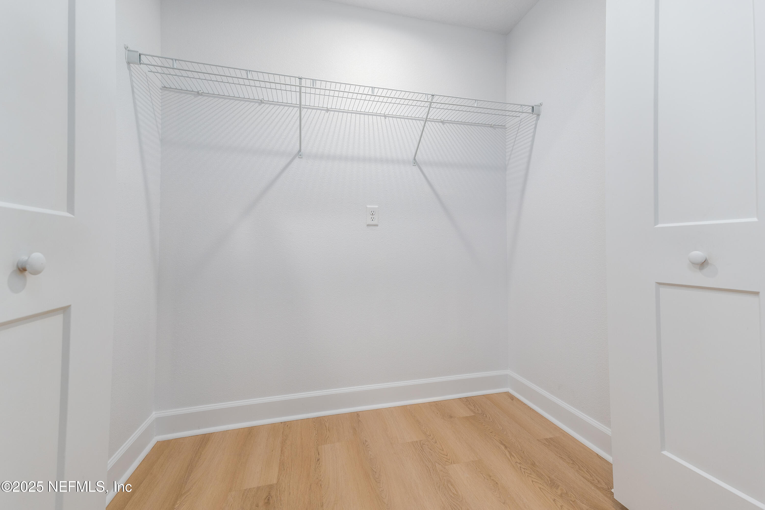 5640 Cherokee Street Keystone Heights, FL 32656 - Photo 15 of 20 a view of a room with racks on the wall