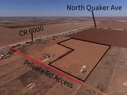 a sign on a street next to a road