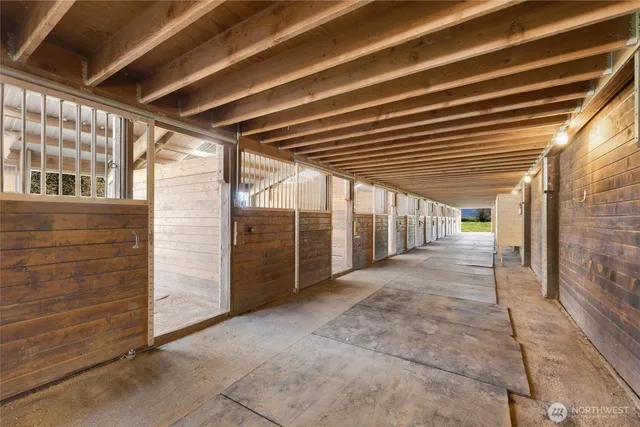 a view of backyard with patio