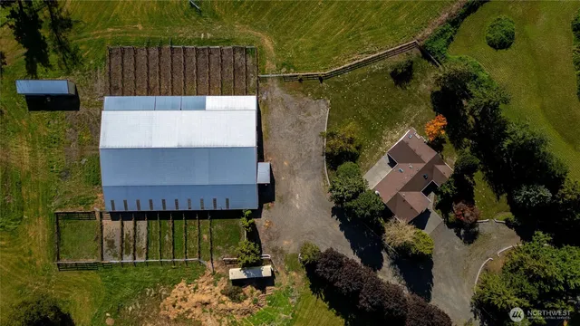 an aerial view of a house with a garden