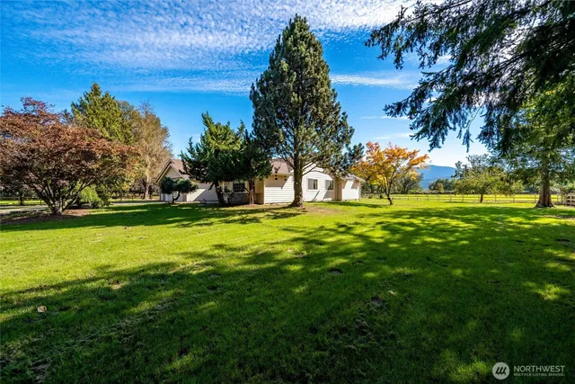 a view of swimming pool with tree s