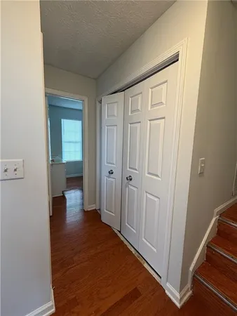 a view of a room with racks on the wall