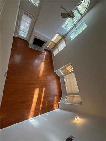 a view of kitchen with furniture and wooden floor