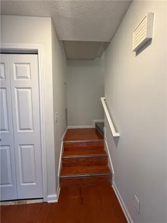 a view of a room with racks on the wall