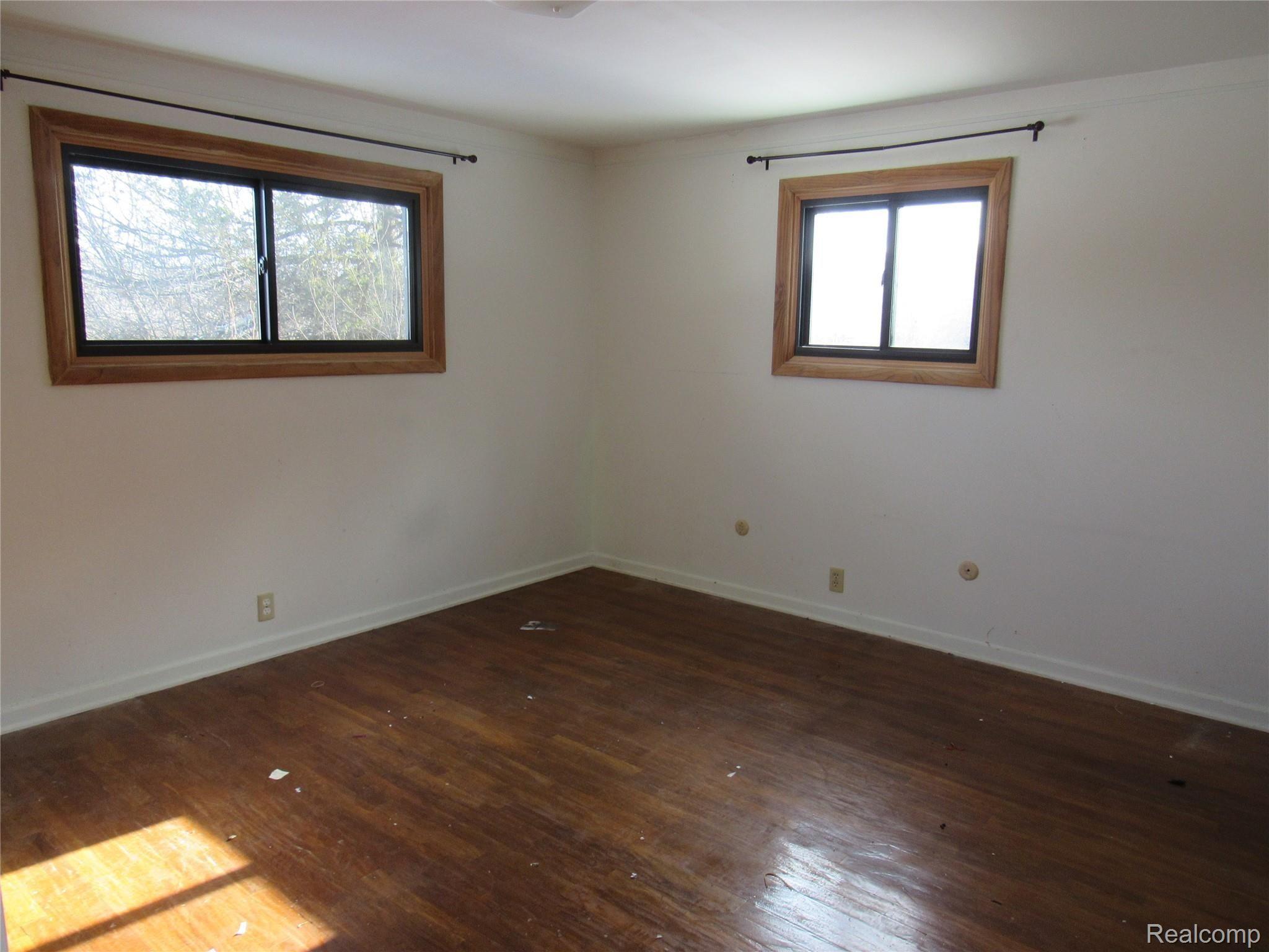 5740 Textile Road Ypsilanti, MI 48197 - Photo 15 of 62 Bedrooms feature Hardwood flooring and Vinyl windows
