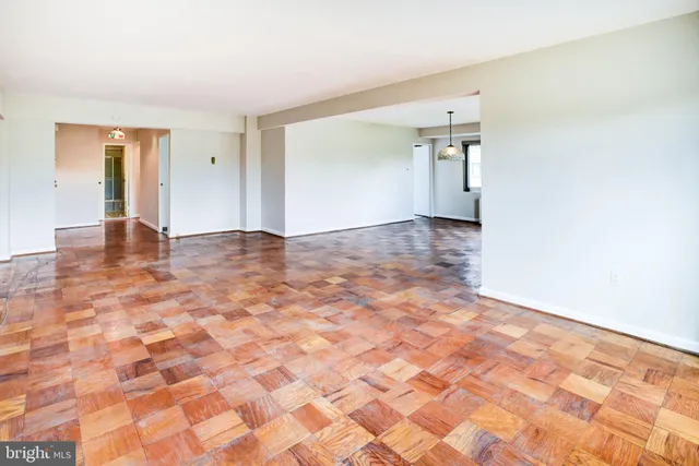 a view of an empty room and window