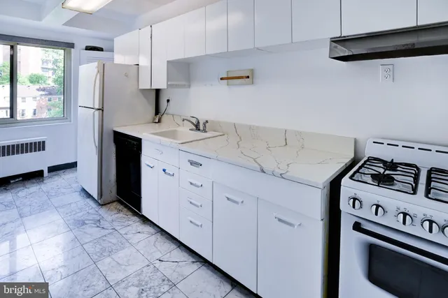 a bathroom with a sink and toilet