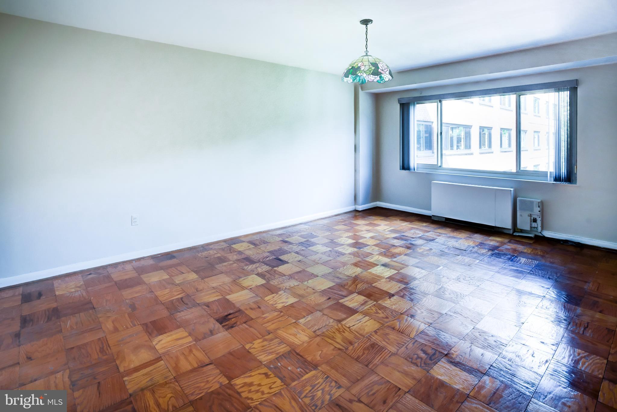 4201 Cathedral Avenue Northwest, Unit 1004E Washington, DC 20016 - Photo 34 of 69 a view of an empty room with a window